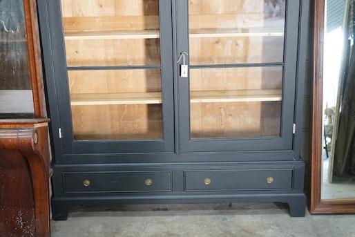 A French painted glazed pine two door bookcase, width 155cm, depth 27cm, height 211cm